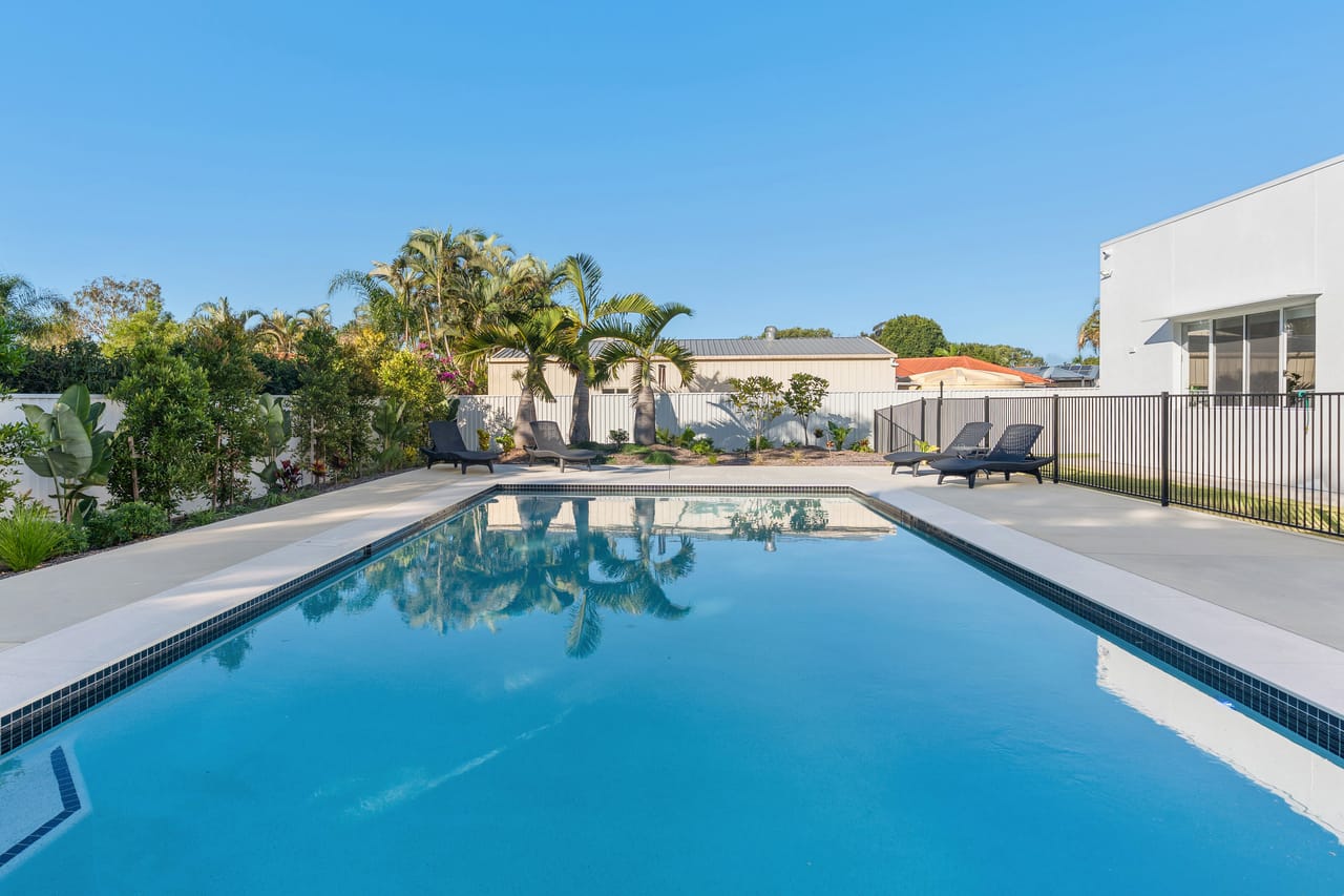 The Hide Away's pool and garden